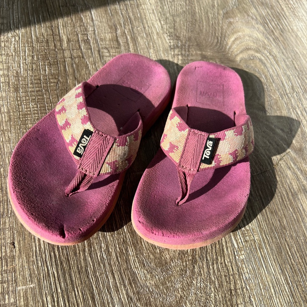 Pink teva flip flops